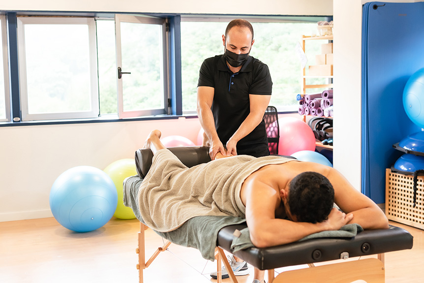 Athlete receiving sports massage to aid muscle recovery