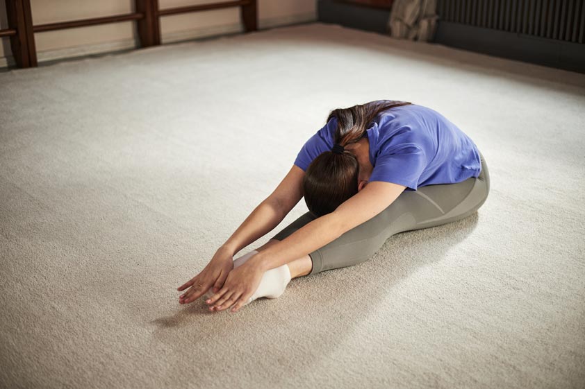 Teenage Caucasian Girl Stretching Forward