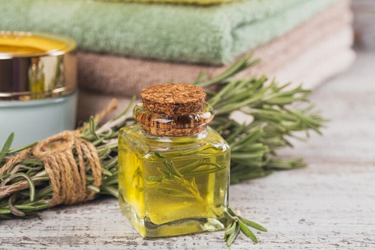 Essential Oil and Fresh Rosemary for Wellbeing