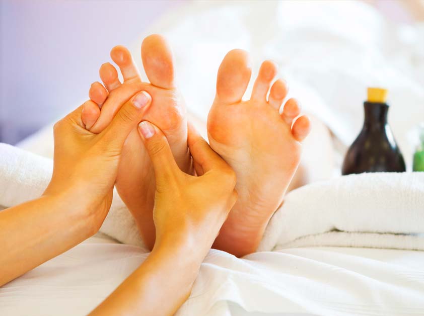 massage of female foot in spa